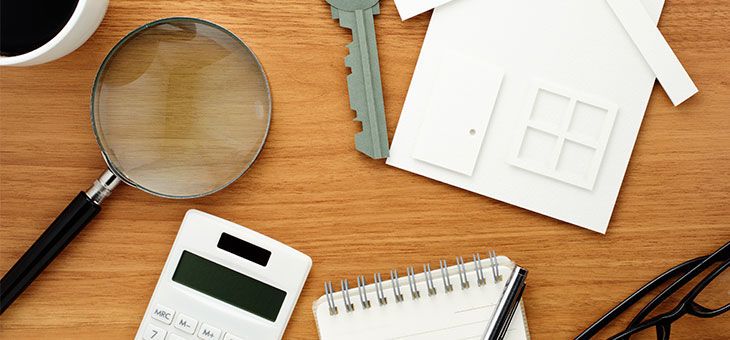 Maison et calculatrice 